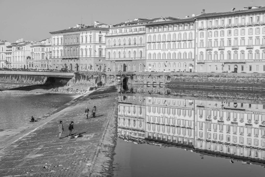 A view of the Arno River in Florence during wintertime.